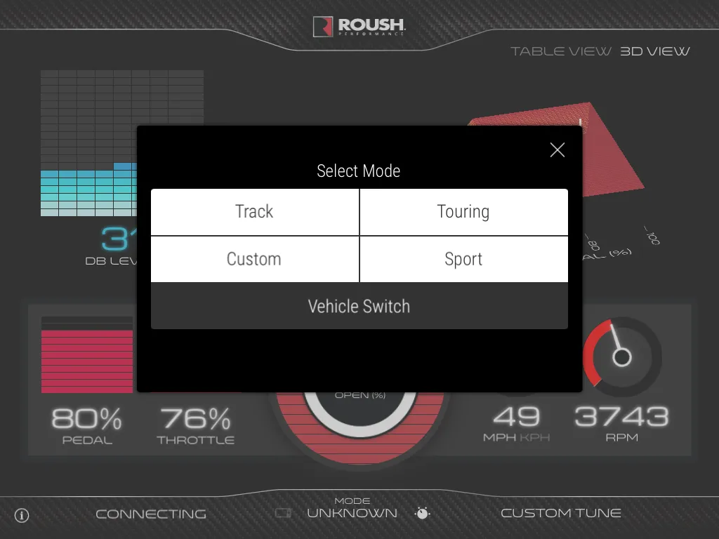 Mode selection dialog offering Track, Touring, Custom, Sport and Vehicle Switch