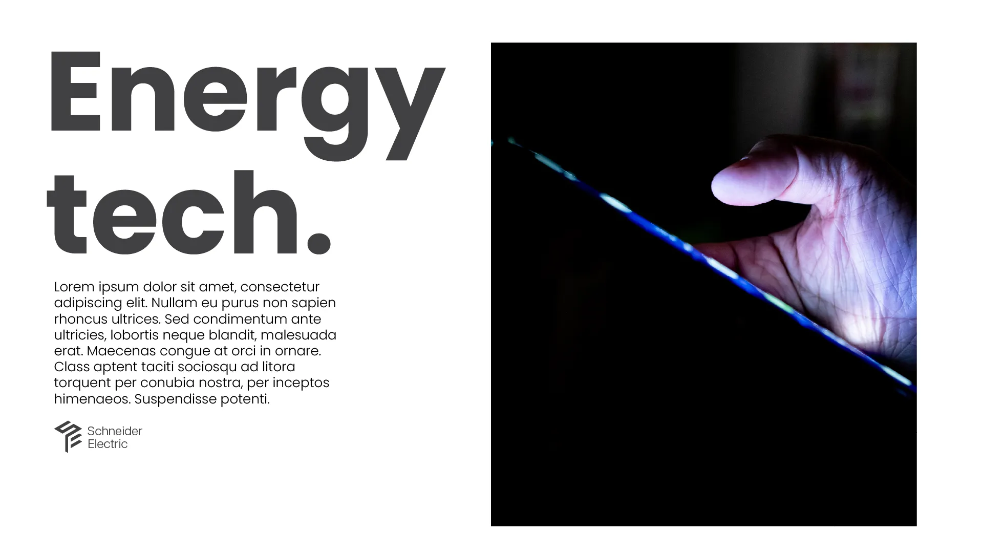 White layout, close crop on a hand at the edge of a lit tablet