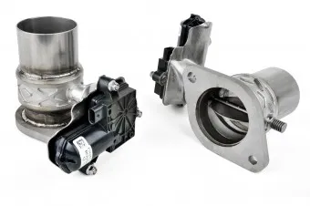 Two electronically actuated exhaust valves photographed on white, one open and one closed